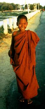 A very cheerful and handsome Novice Monk met at 6 in the morning on alms collection round